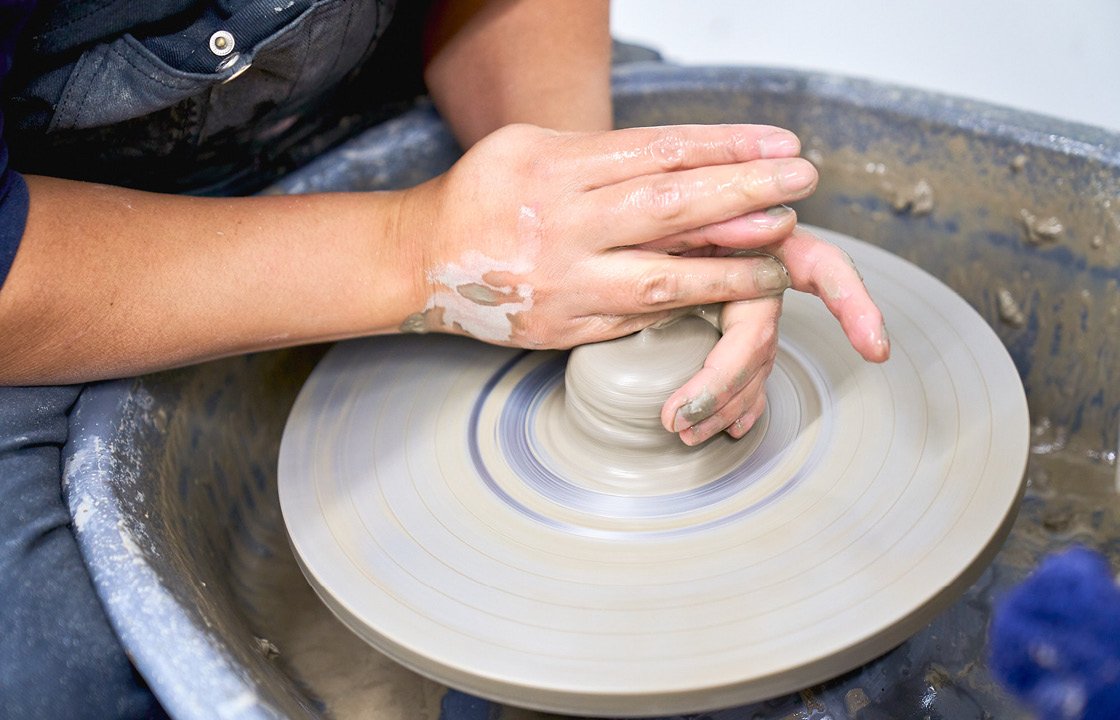 Close-up of someone creating pottery