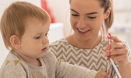 A practictioner looking after a child